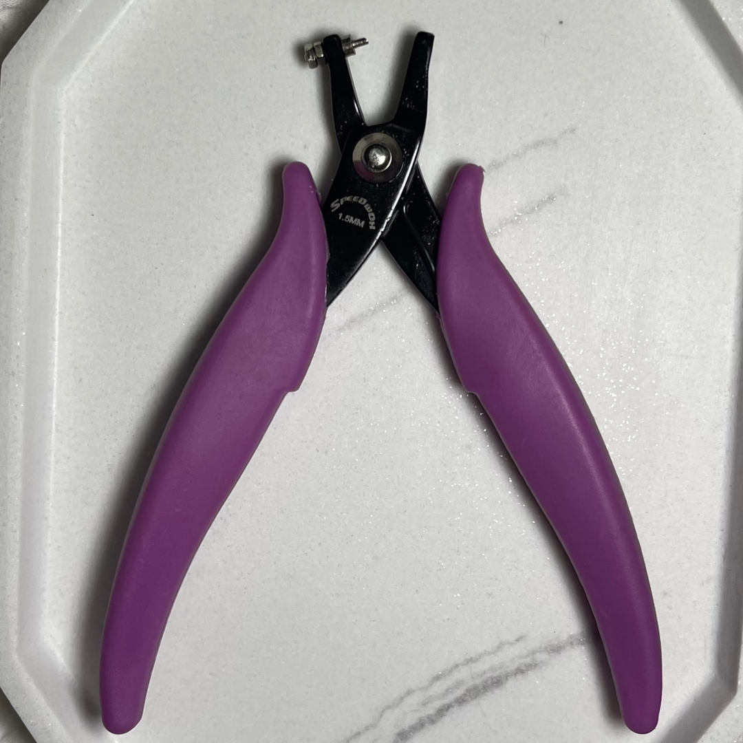 A pair of purple-handled 1.8mm hole punch pliers on a white background.