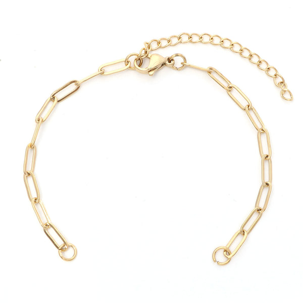 Gold chain bracelet on a white background