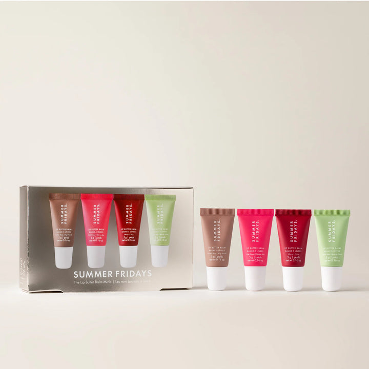 Set of Summer Fridays lip balm tubes with packaging on a light background